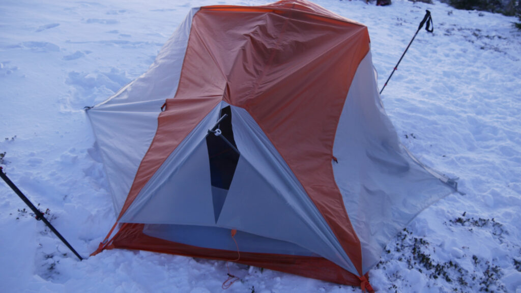 Wind damaged tent
