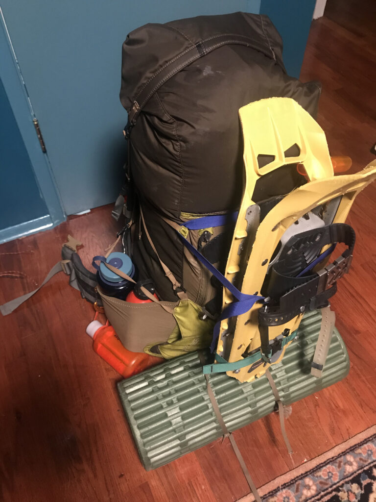 backpack with snowshoes attached