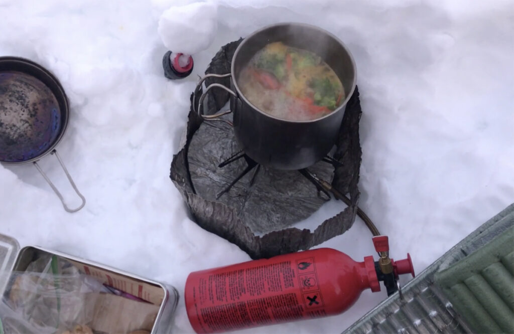 cooking with a liquid fuel stove